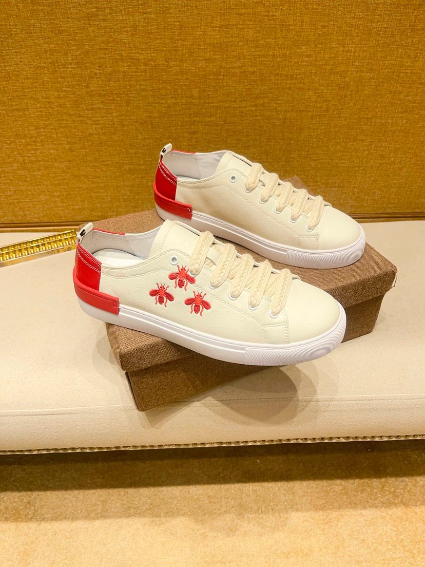 White Low-Top Sneakers with Red Floral Accents